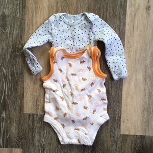 Two newborn onesies. Sleeveless and long sleeve